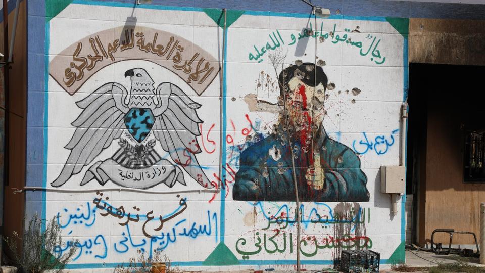صورة لمحسن الكاني على جدران أحد المعتقلات التابعة للكانيات